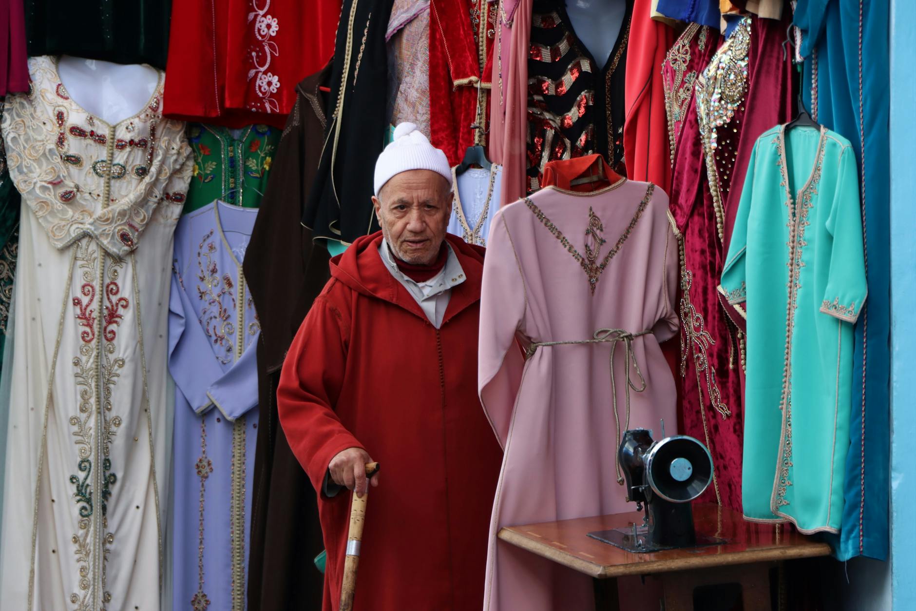 traditional clothing shop with elderly man in morocco